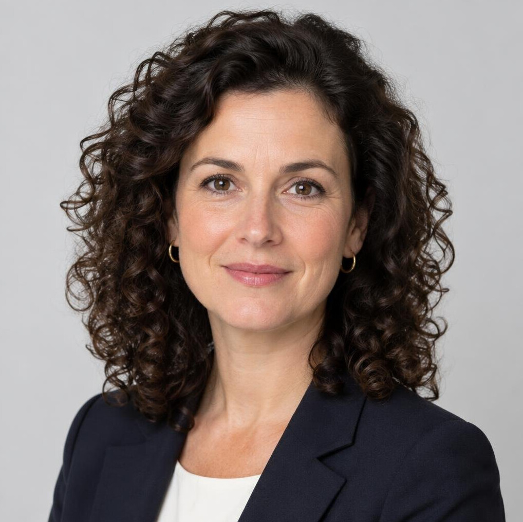 Studio portrait of a professional woman with curly hair